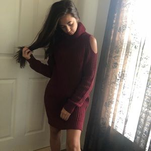 Oversized sweater dress with peekaboo shoulders.